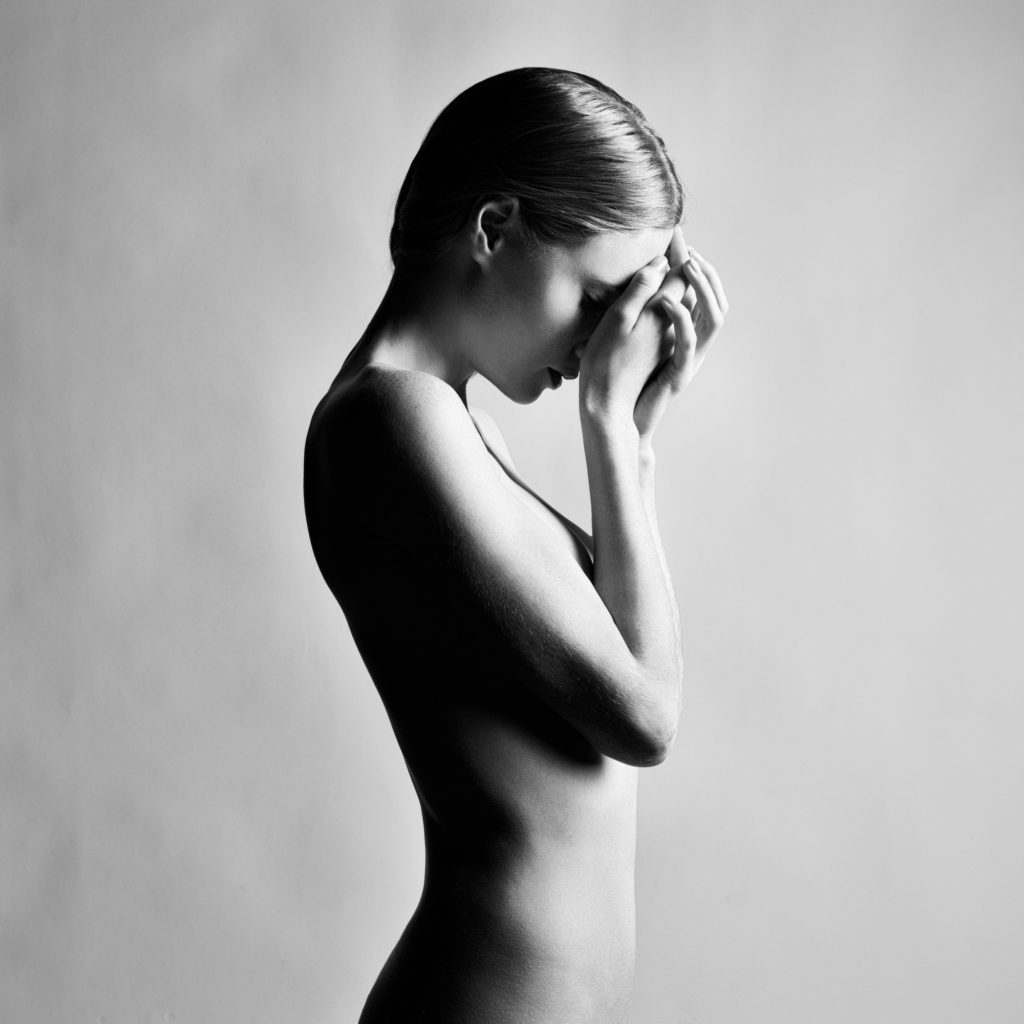 Fashion photo of beautiful nude woman. Black and white