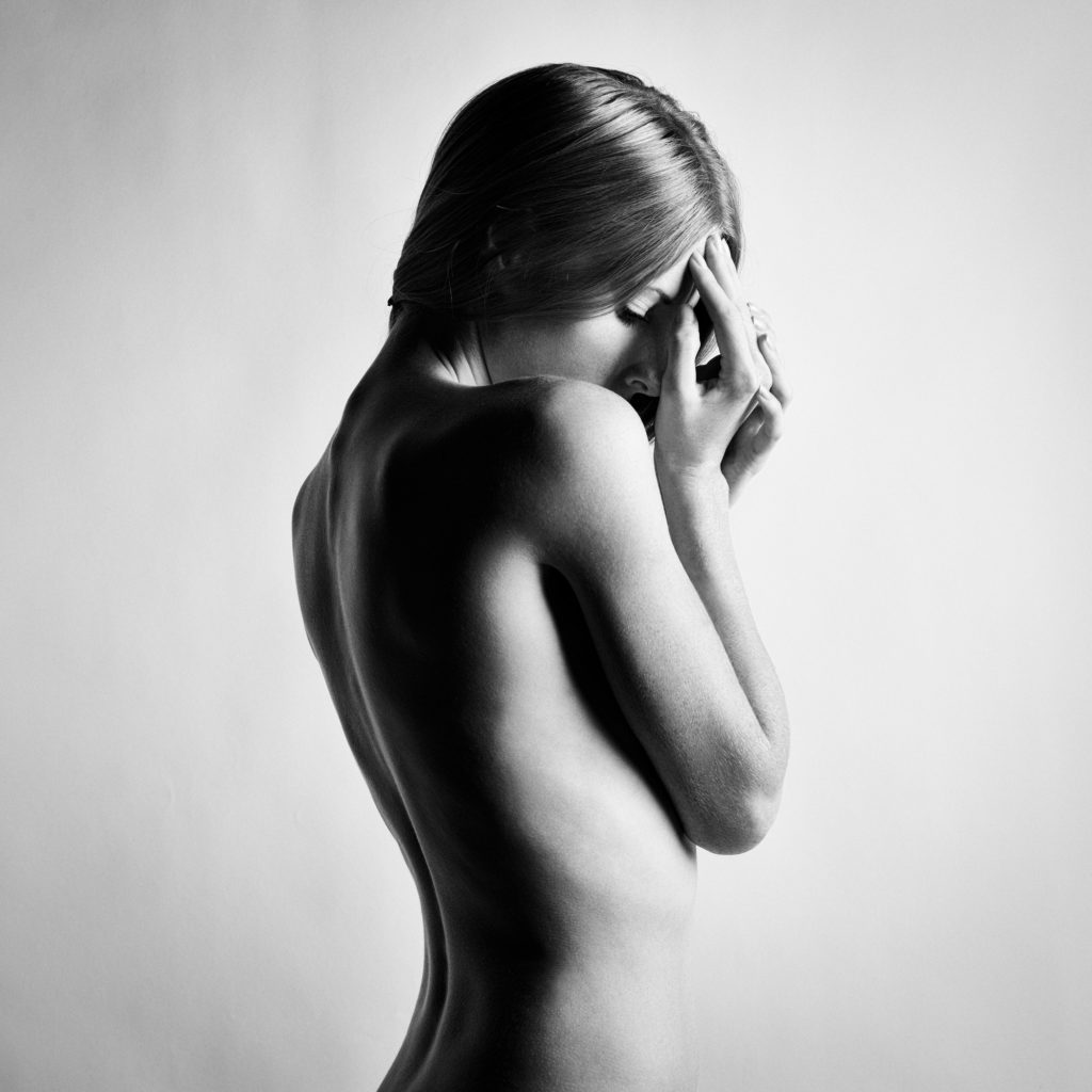 Fashion photo of beautiful nude woman. Black and white